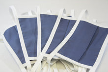 Load image into Gallery viewer, A group of five blue face masks with ties against a white background